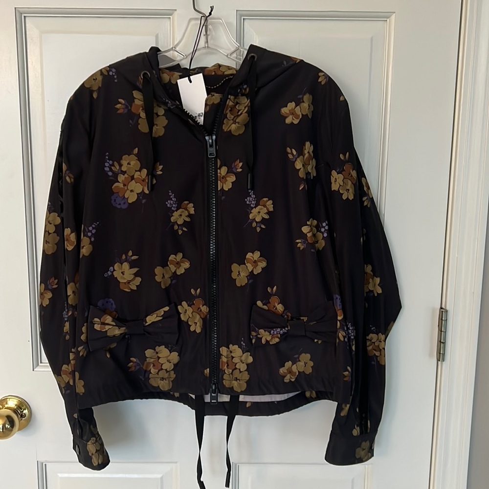 Never worn Coach Jacket. Sz 6 100% Polyester. Light weight.
